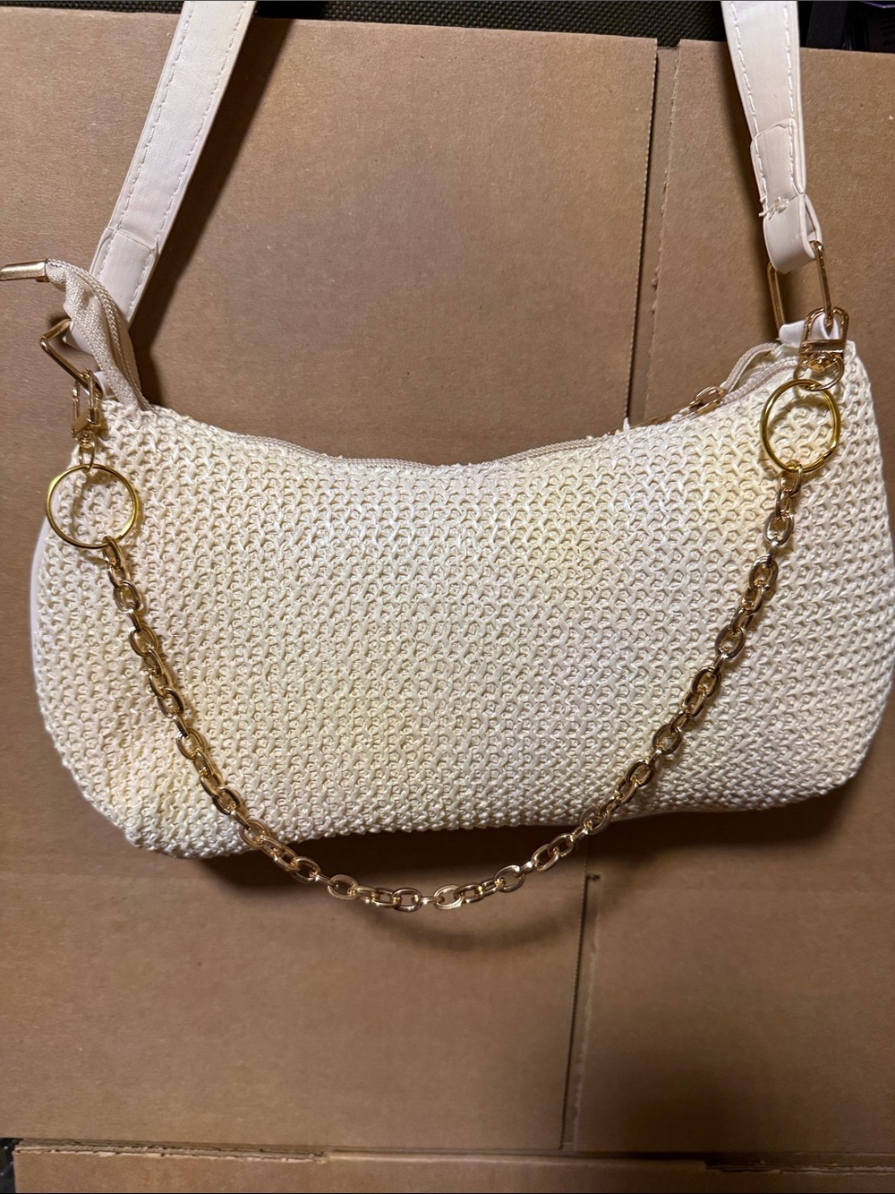 Woven Cream Shoulder Bag with Gold Chain. Bag not for sale